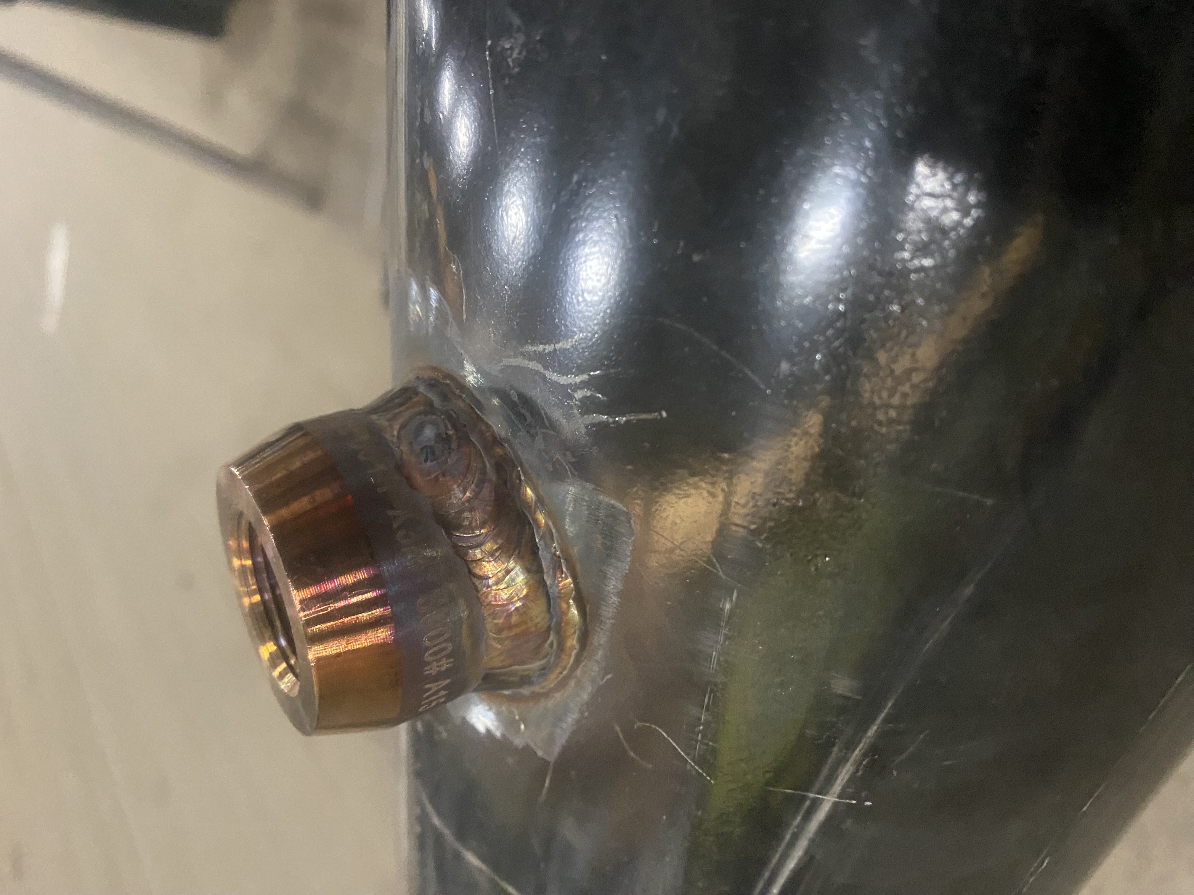 Welded half coupling on pipe - example of precision welding work